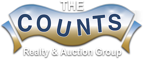 The Counts Realty & Auction Group Logo